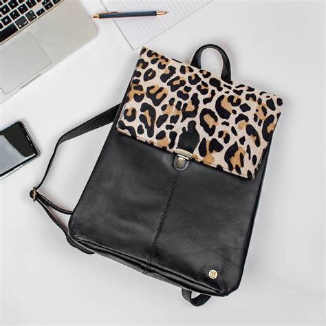 leopard print leather rucksack.